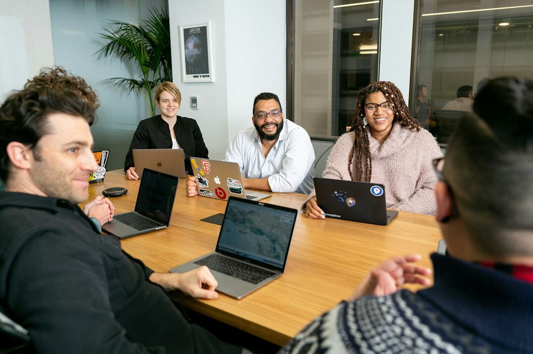asian tech team meeting