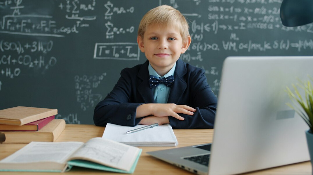 kids learning to code in classroom