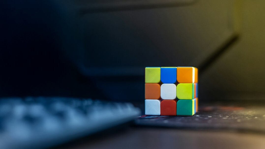 Laptop screen showing a colorful game built by students